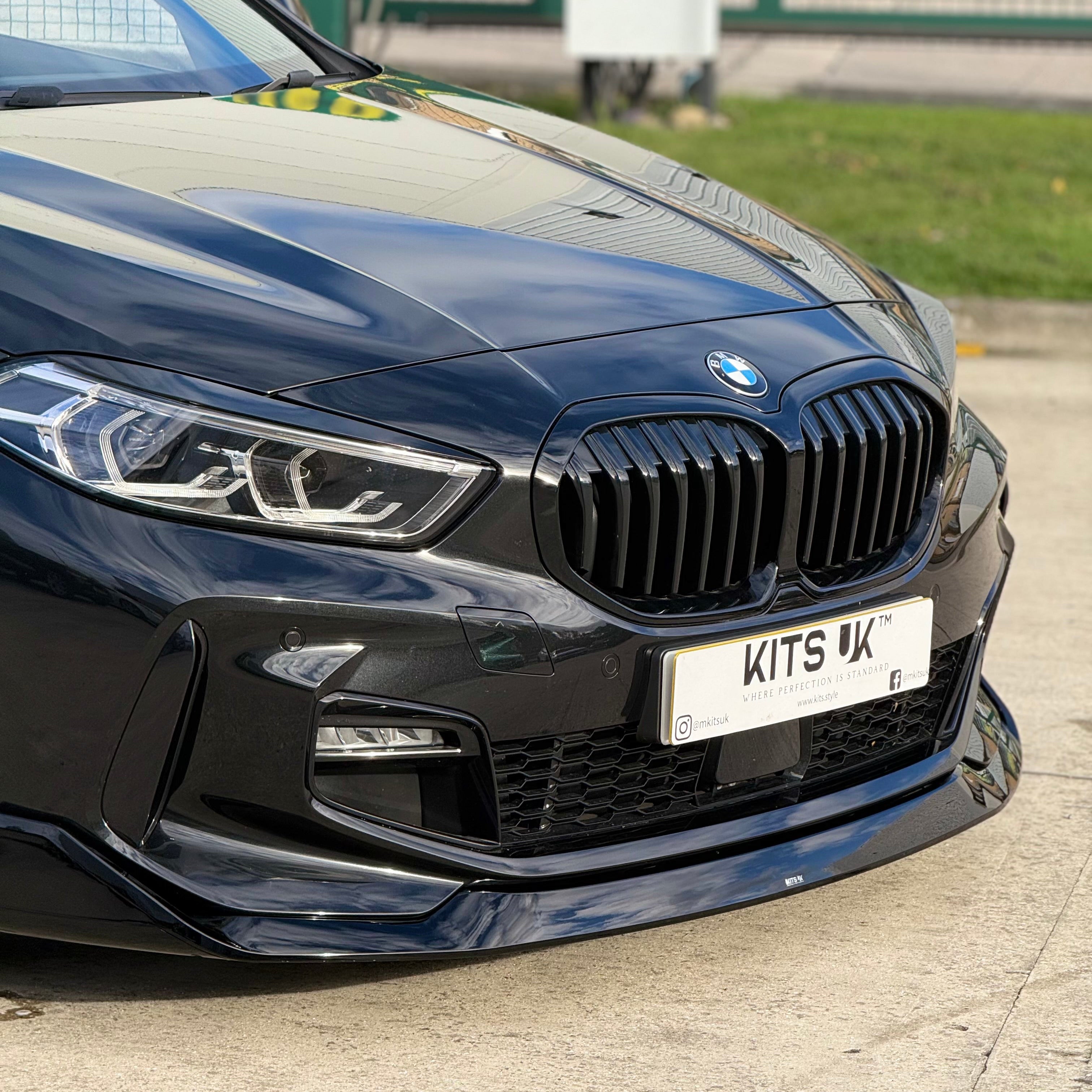 BMW F40 Gloss Black Body Kit on black BMW 1 Series showcasing aggressive styling and performance appearance.