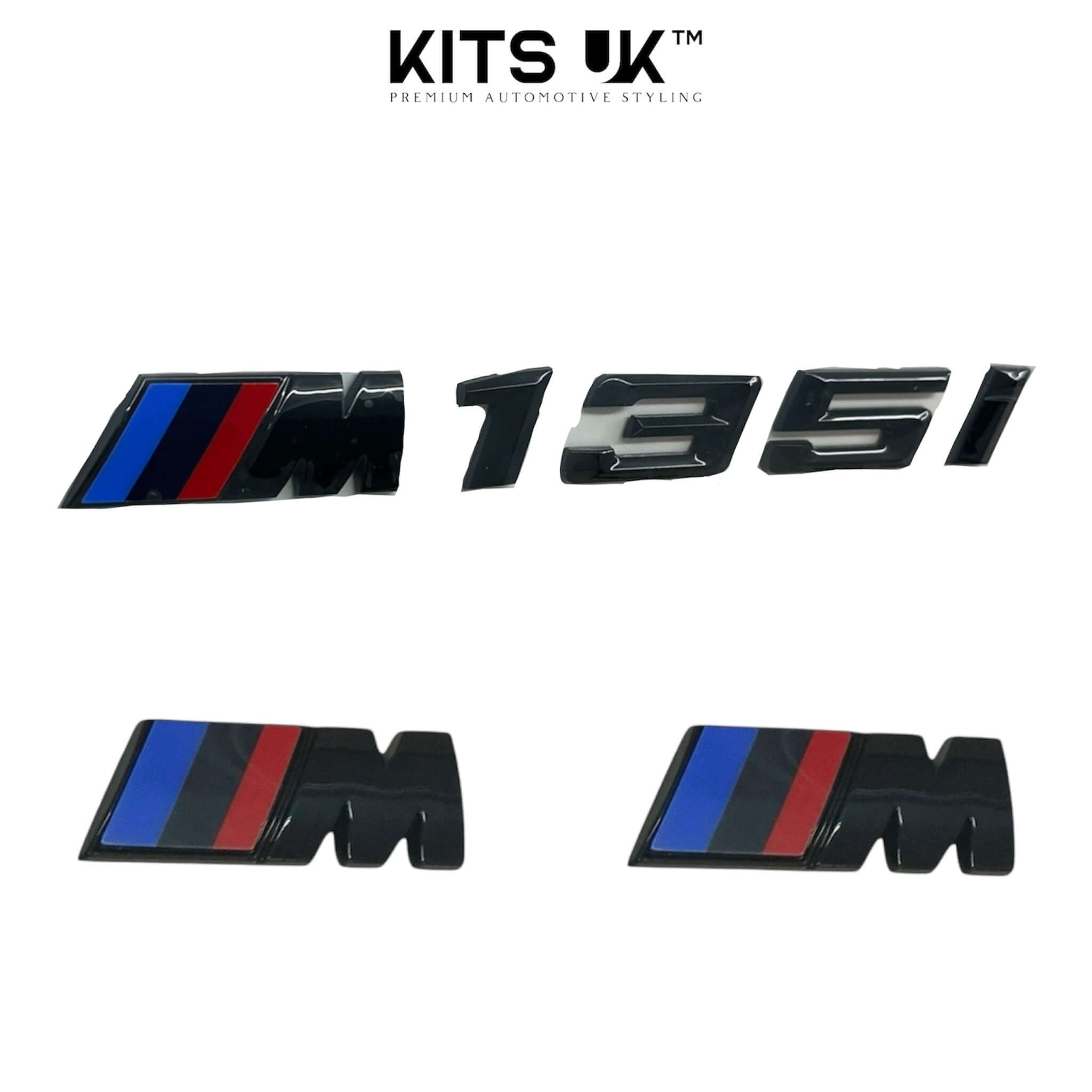 BMW RWD Black Badge Package set featuring black and colored M badges for premium automotive styling