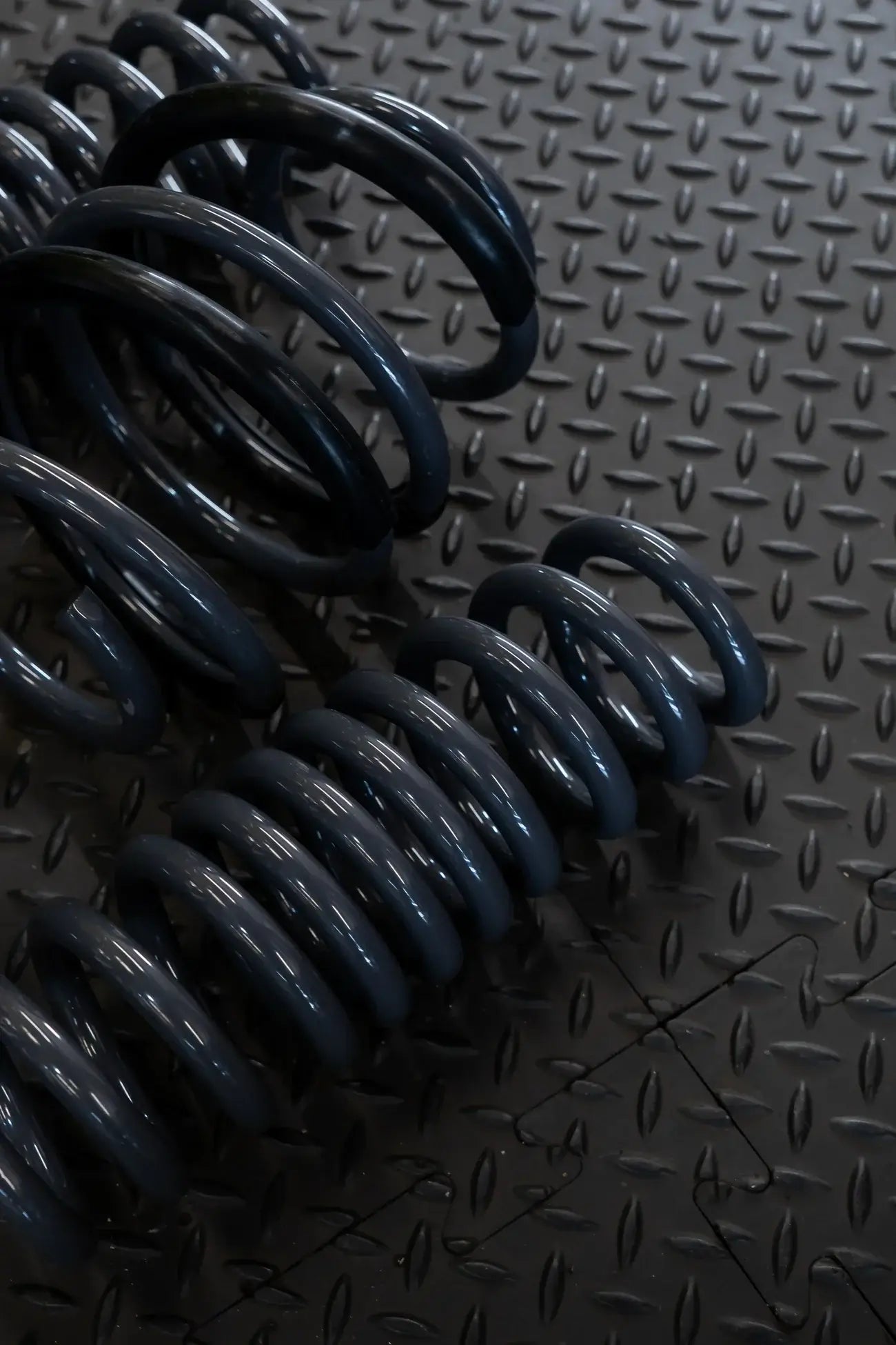 BMW M4 G82/G83, Motech Stance Lowering Spring Kit on textured black surface.