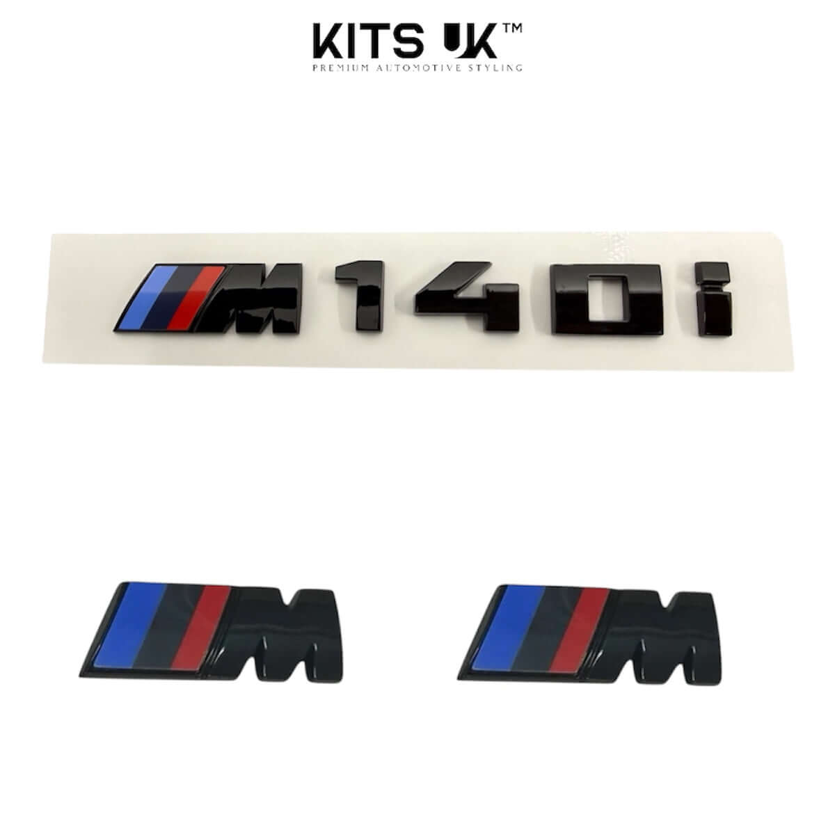 BMW RWD Black Badge Package featuring M140i badges in high gloss black for a modern, sleek appearance.