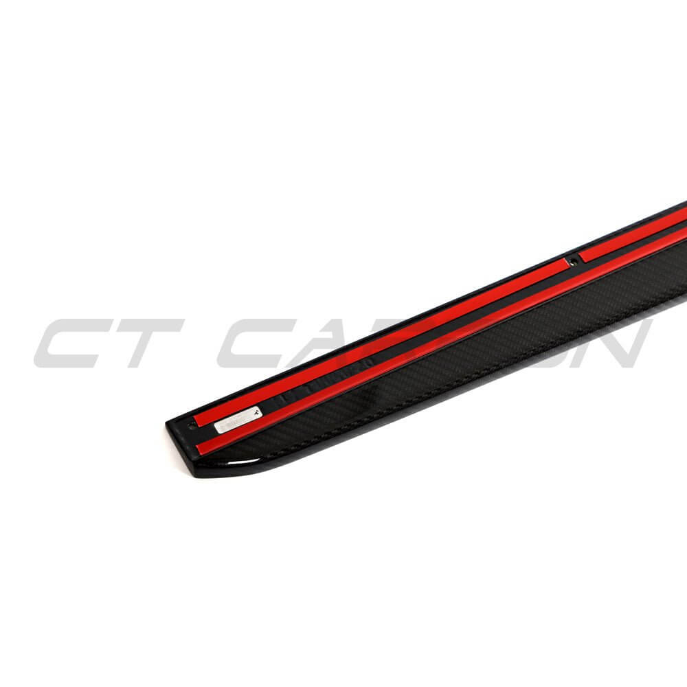 BMW G87 M2 Carbon Fibre Side Skirts showcasing a sleek carbon finish with red accent stripes