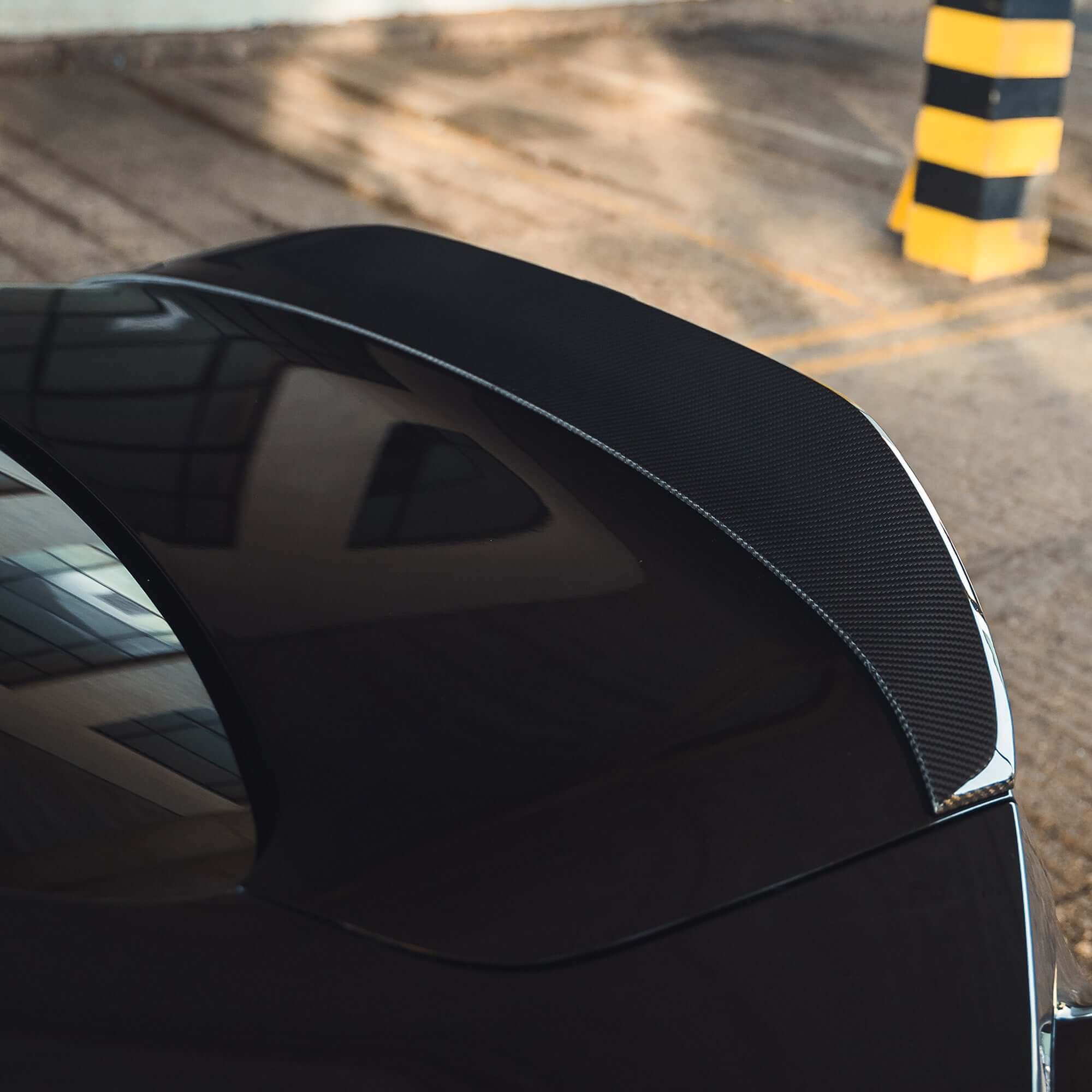 BMW G87 M2 Full Carbon Fibre Body Kit rear spoiler highlighting carbon fibre finish.