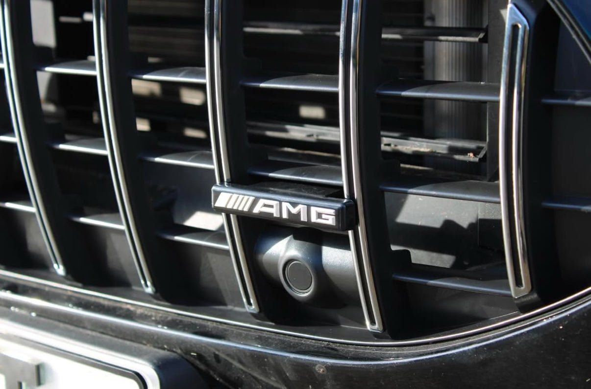 Mercedes W177A35 LCI Panamericana Grille featuring AMG badge in Gloss Black and Chrome