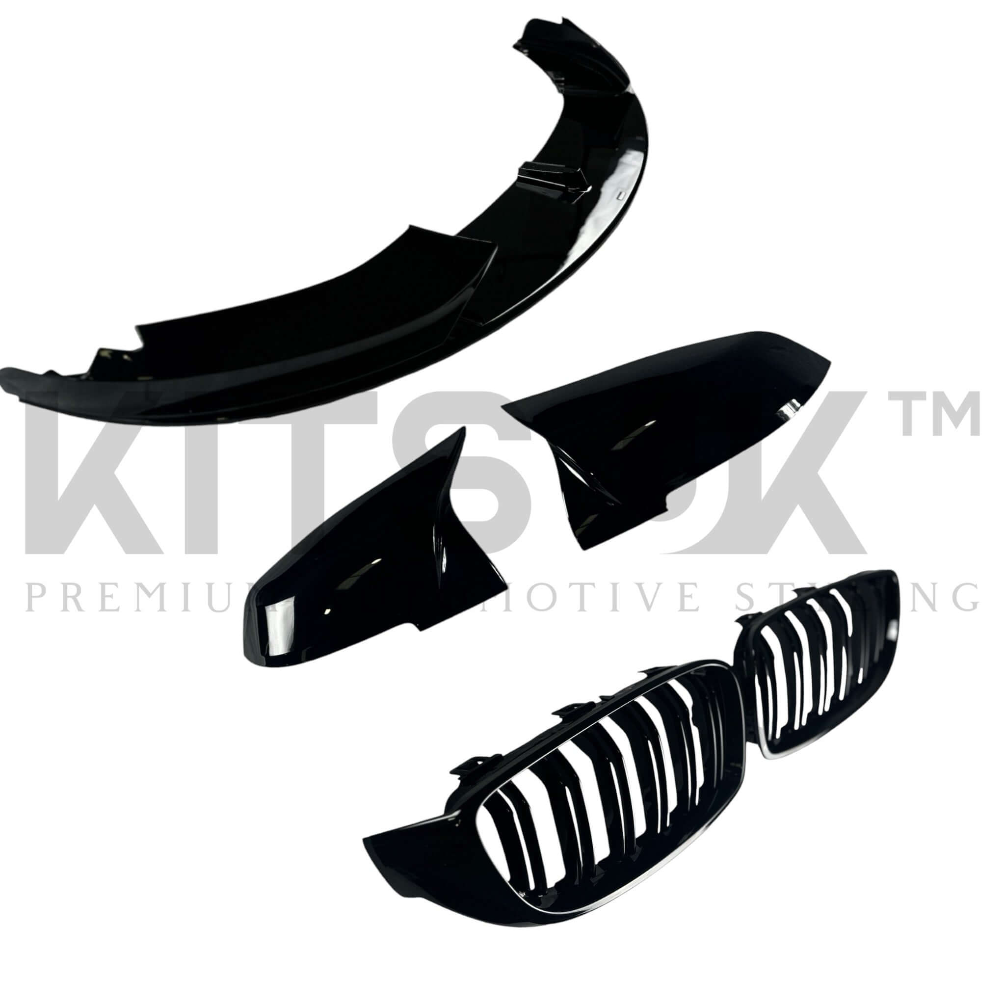 BMW 4 Series F32 F33 F36 front end package components including front splitter and grilles in gloss black finish.