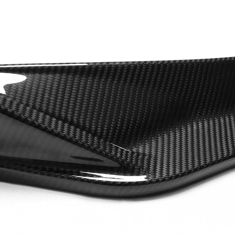 BMW M3 M4 carbon fibre splitter - VS style showing detailed carbon fiber pattern and glossy finish.