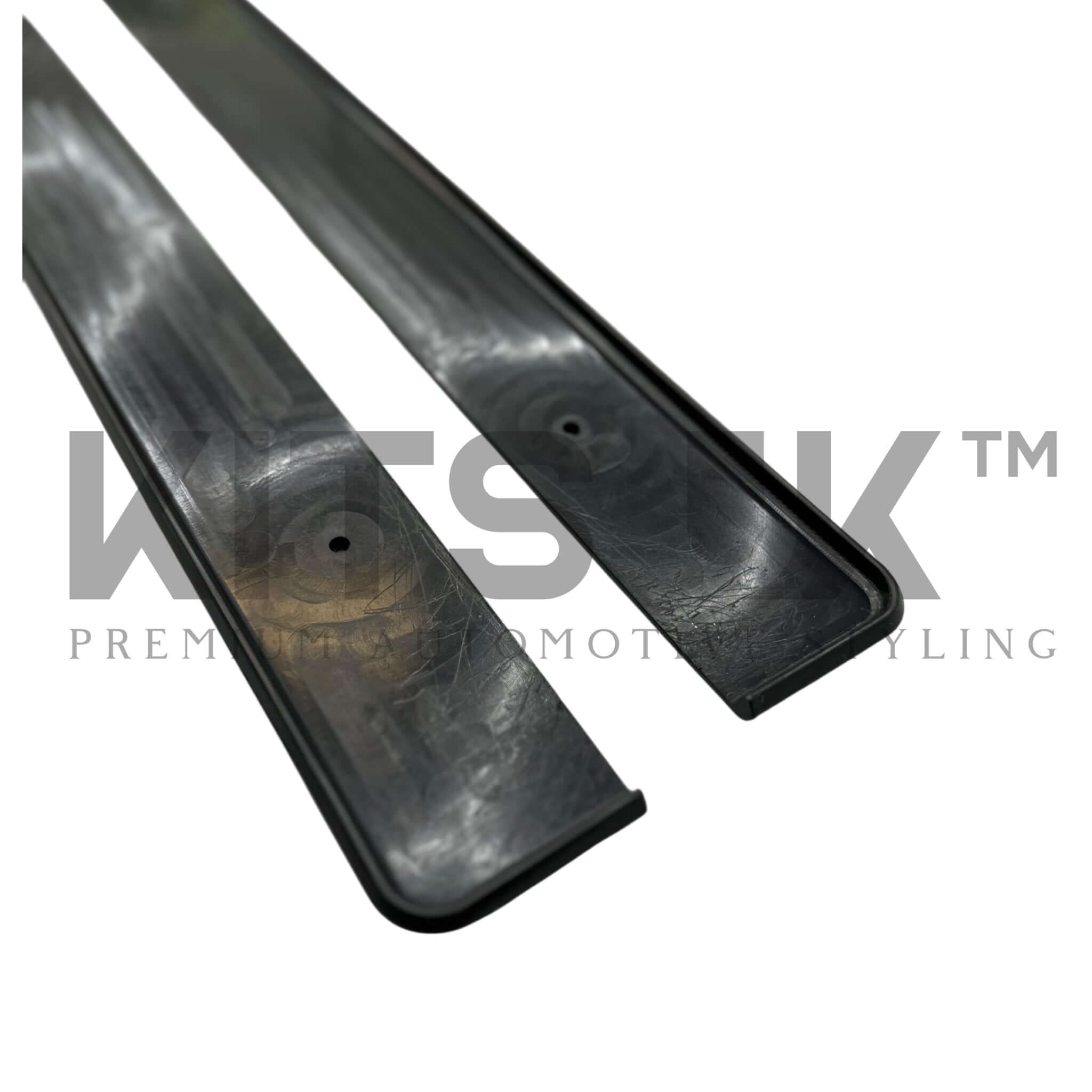 Mercedes C Class side extensions black side skirt extensions displayed on a white background.