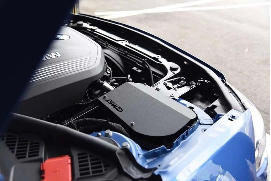 MST Performance Induction Kit for 1234 Series 3.0 B58 BMW installed in a BMW engine bay.