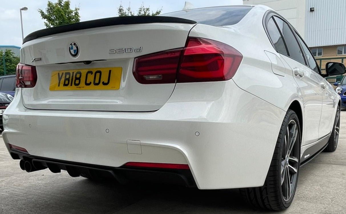 BMW F30 Performance Package showcasing rear styling of a white BMW 3 Series 2013–2019 model.