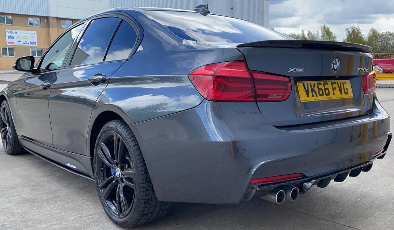 BMW F30 Performance Package on a BMW 3 Series F30 model showcasing a stylish rear view with performance enhancements.