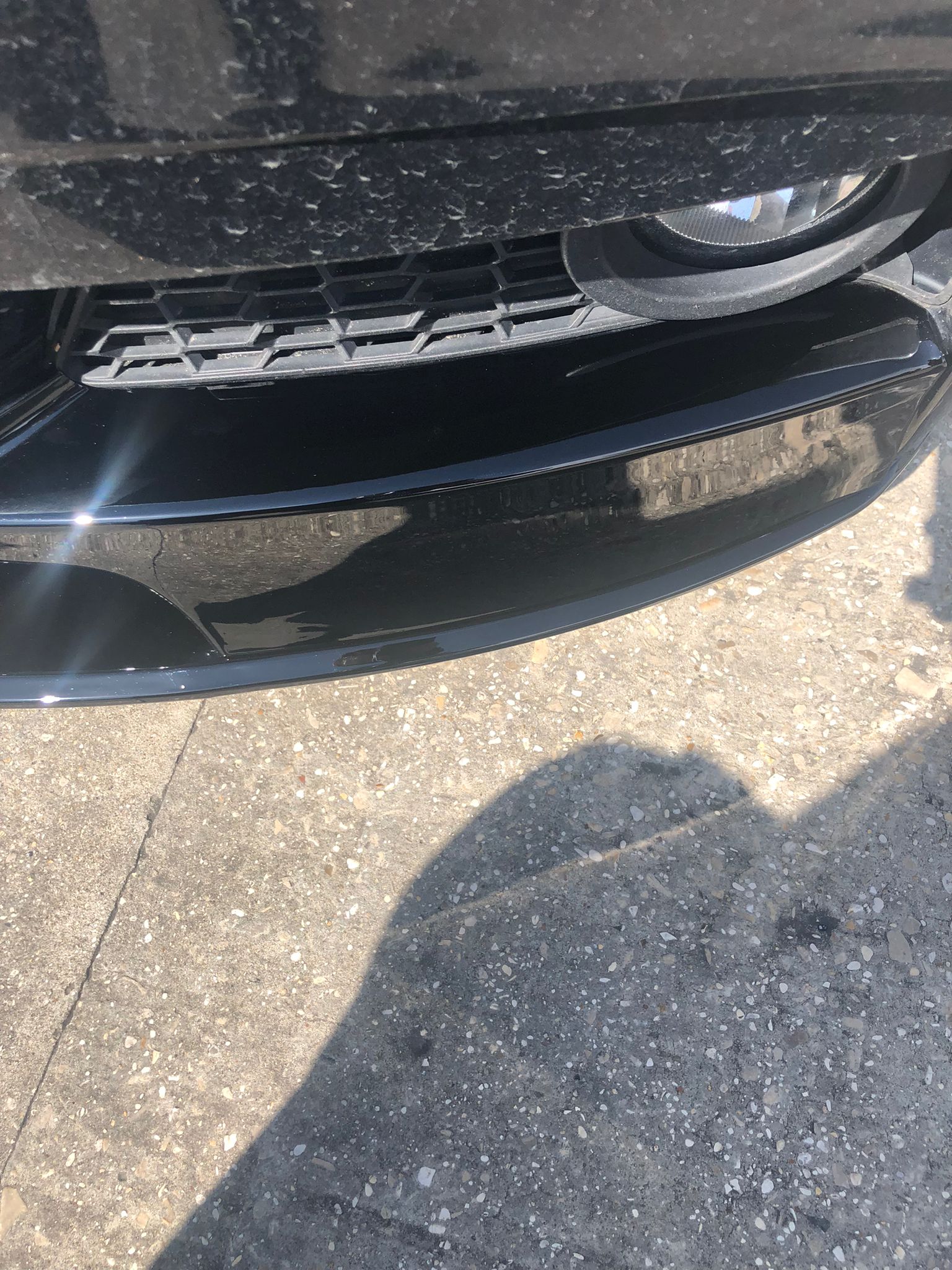 BMW F31 Touring body kit lower front splitter showcasing sleek design and glossy black finish.