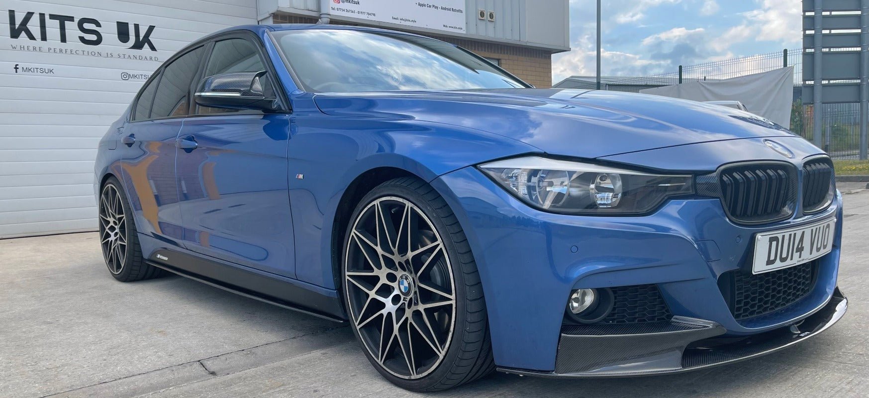 BMW F30 Performance Package displayed on a blue BMW 3 Series with stylish wheels and a sporty exterior.