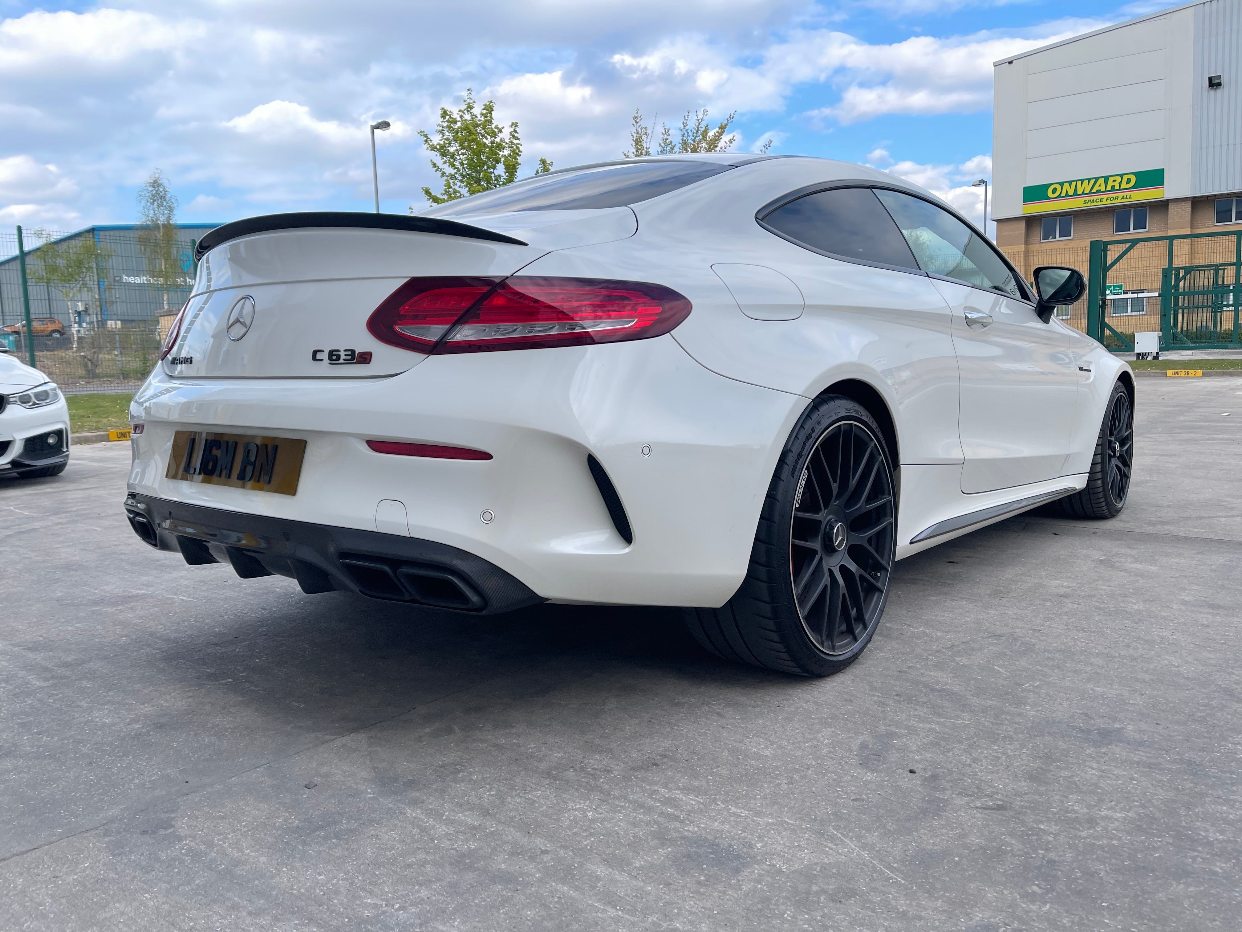 Mercedes-Benz C63 AMG W205 coupe gloss black parts – front splitter, rear diffuser, side skirts kit