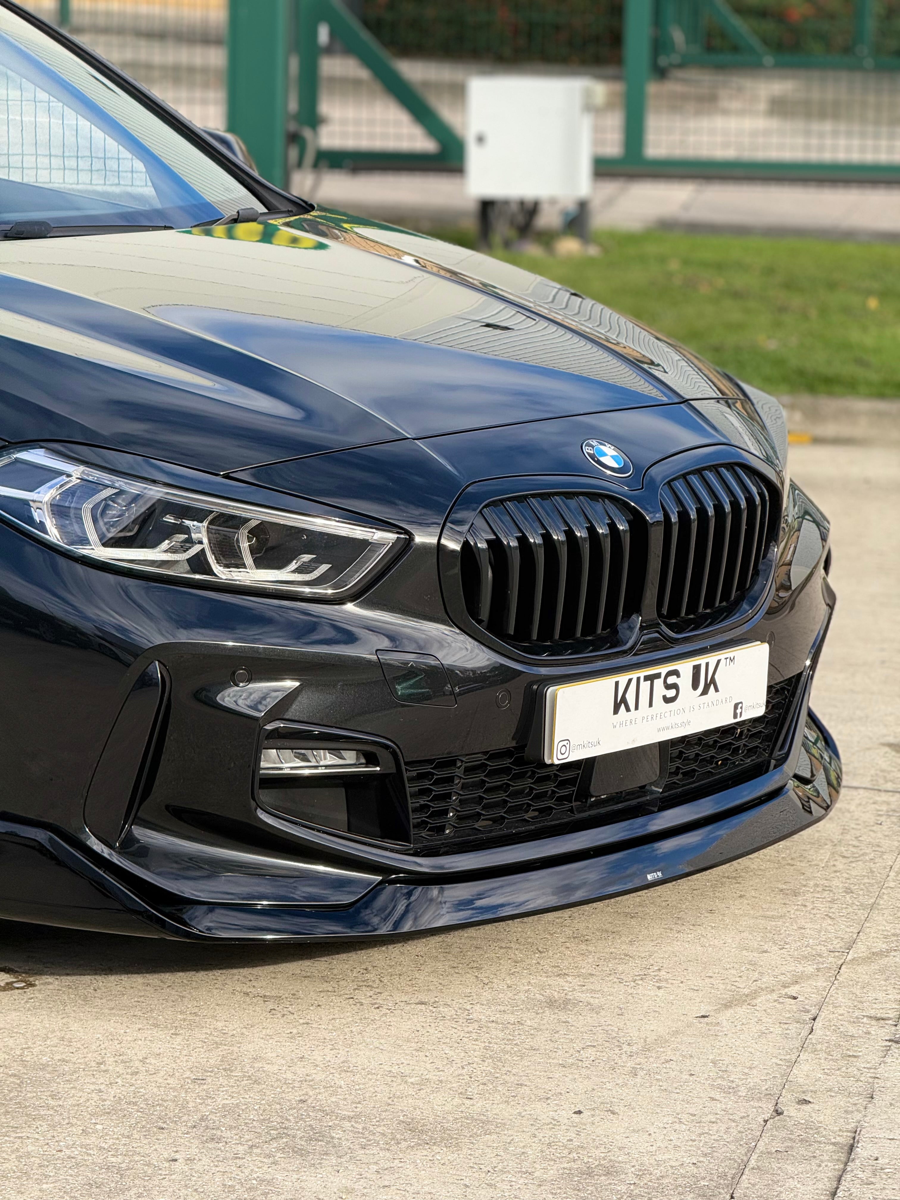 BMW F40 Gloss Black Body Kit on black BMW 1 Series showcasing aggressive styling and performance appearance.