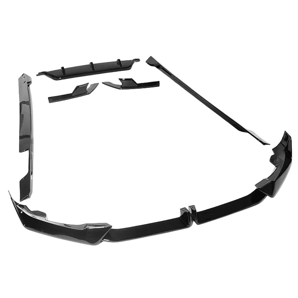 BMW G06 X6 LCI gloss black kit components displayed on a white background, showcasing the high-quality ABS plastic finish.