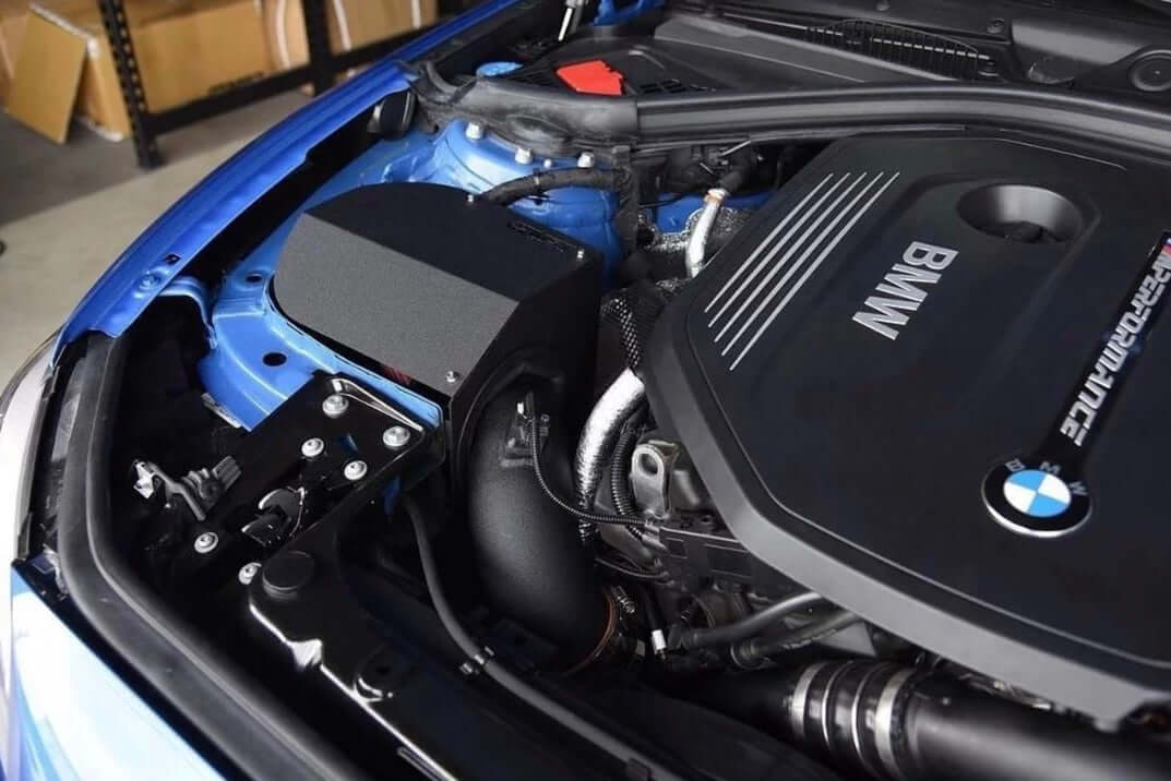 MST Performance Induction Kit for 1234 Series 3.0 B58 BMW installed in engine bay of BMW.